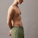 Thumbnail of calvin-klein-logo-tape-short-drawstring-swim-shorts---battle-green_587904.jpg