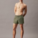Thumbnail of calvin-klein-logo-tape-short-drawstring-swim-shorts---battle-green_587905.jpg