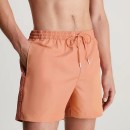 Thumbnail of calvin-klein-medium-drawstring-logo-tape-swim-shorts---clay-pink_562727.jpg