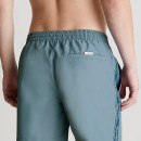 Thumbnail of calvin-klein-medium-drawstring-logo-tape-swim-shorts---muted-cerulean_562660.jpg